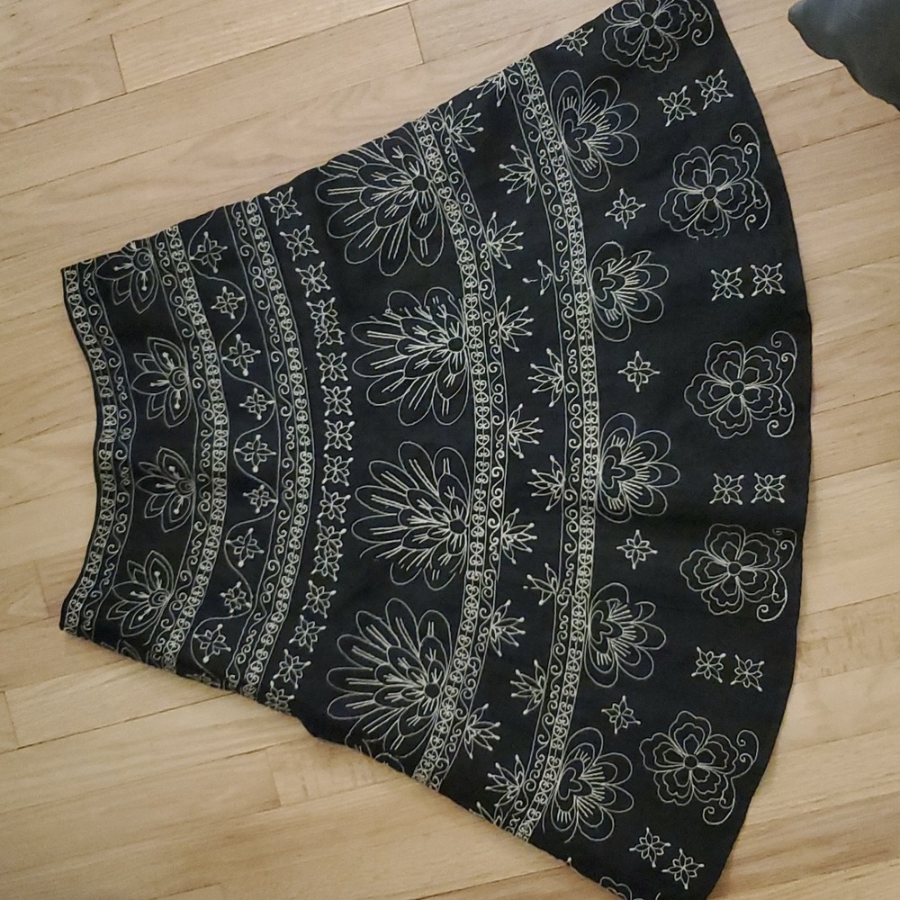 Below the knee black with tan embroidered pattern skirt